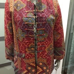 Red patterned and hand stitched jacket